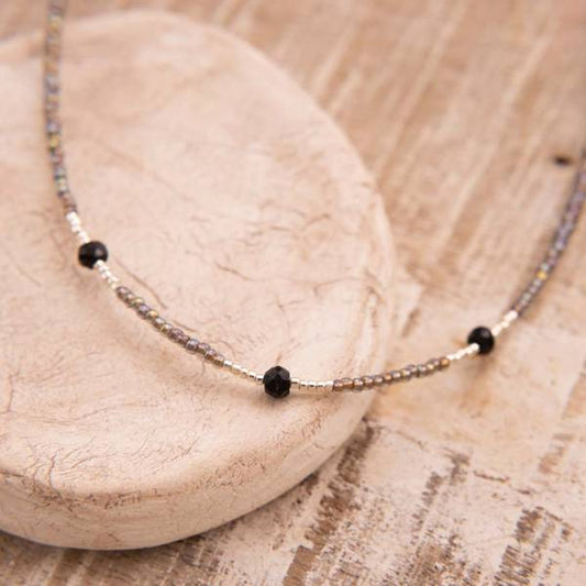 Brightly black onyx and glass bead necklace